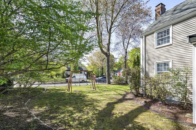 view of yard with fence
