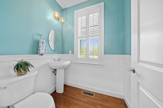14 Dorset Park Ln, Weymouth, MA 02190 - bathroom featuring toilet, wood finished floors, a sink, and baseboards