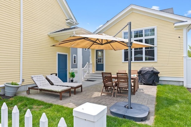 14 Dorset Park Ln, Weymouth, MA 02190 - back of property with a patio