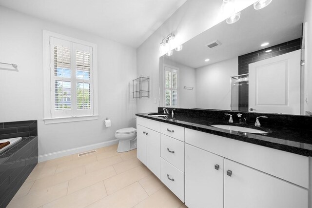 14 Dorset Park Ln, Weymouth, MA 02190 - full bathroom with baseboards, double vanity, healthy amount of natural light, and a bath