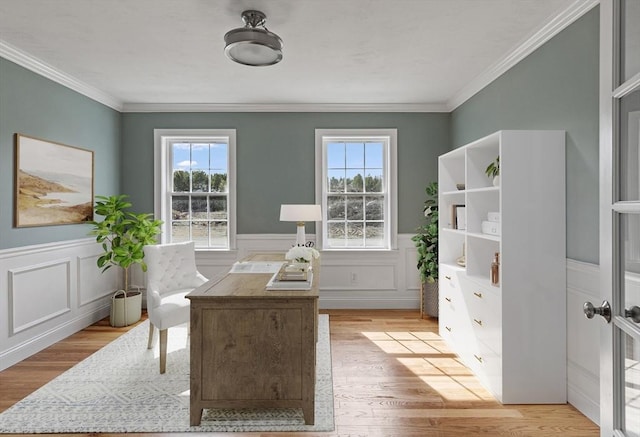 home office with light wood-type flooring, a wealth of natural light, and ornamental molding