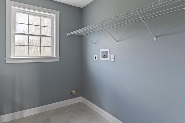 washroom featuring electric dryer hookup, hookup for a washing machine, laundry area, and baseboards