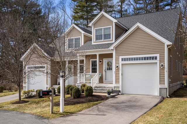 cape cod-style house featuring a garage, aphalt driveway, a porch, and a shingled roof