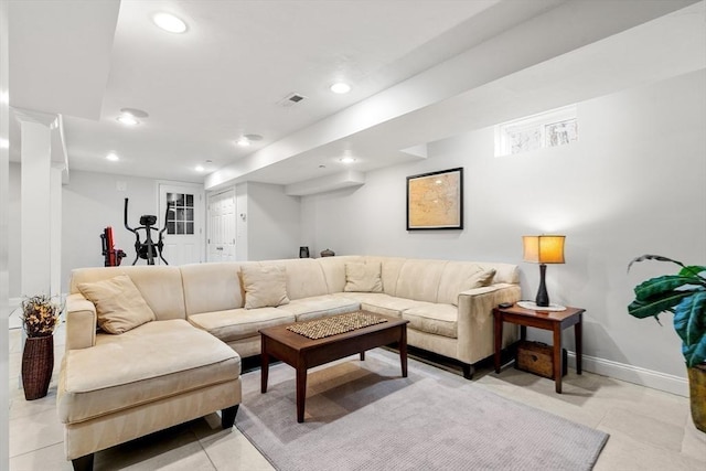 living room with recessed lighting, visible vents, baseboards, and light tile patterned floors