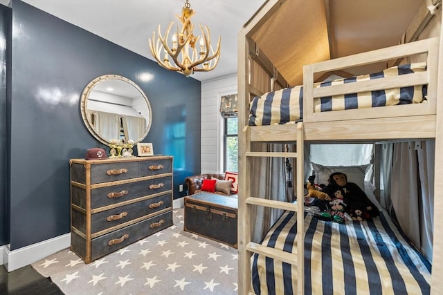 11 Beckler Ave, Boston, MA 02127 - bedroom featuring a chandelier and baseboards