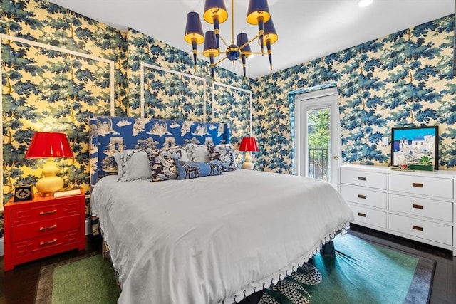 11 Beckler Ave, Boston, MA 02127 - bedroom with wallpapered walls, a chandelier, wood finished floors, and access to outside