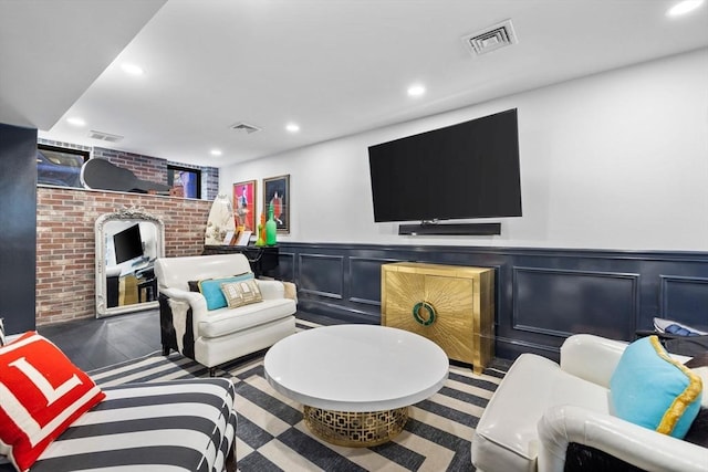 11 Beckler Ave, Boston, MA 02127 - living area with recessed lighting, a wainscoted wall, and a decorative wall