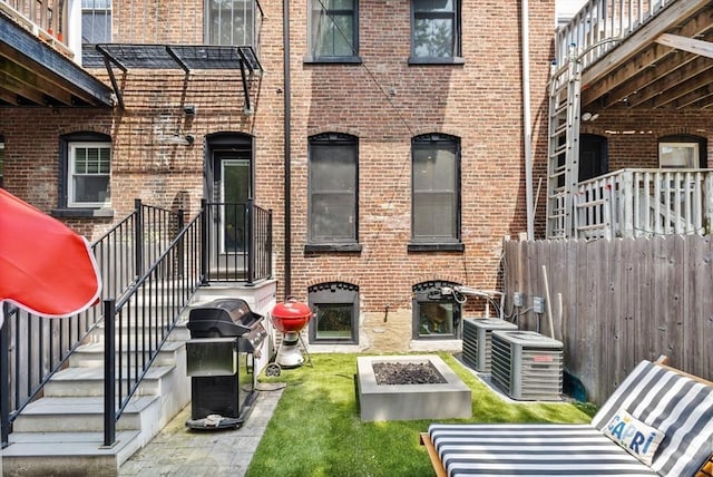 11 Beckler Ave, Boston, MA 02127 - rear view of property featuring brick siding