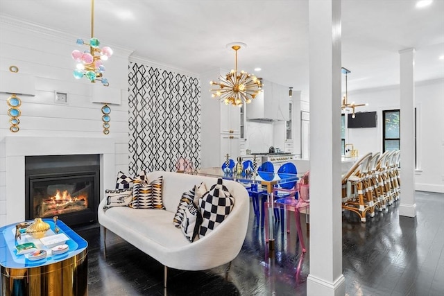 11 Beckler Ave, Boston, MA 02127 - living area featuring a chandelier, wood finished floors, crown molding, a glass covered fireplace, and recessed lighting