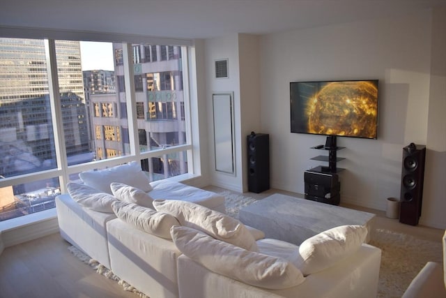 1 Franklin St Unit 2409, Boston, MA 02110 - living room featuring healthy amount of natural light