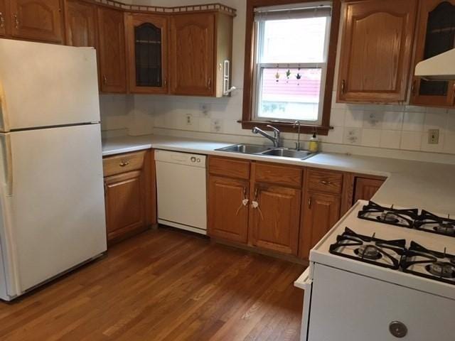 29 Conway St, Boston, MA 02131 - kitchen with white appliances, a sink, dark wood-style flooring, and brown cabinets