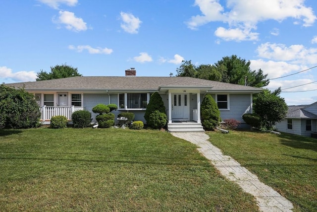 single story home featuring a front yard