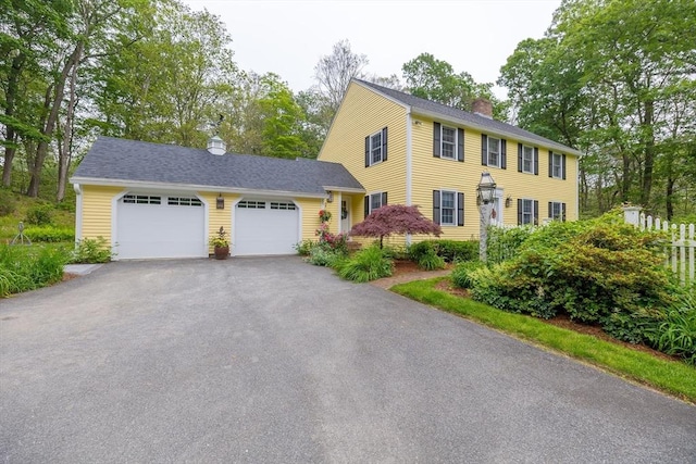 759 Main St, Boxford, MA 01921 - colonial house with a chimney, a garage, and driveway