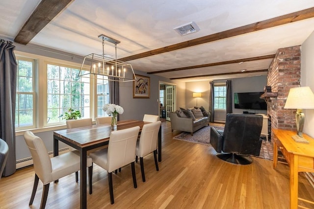 759 Main St, Boxford, MA 01921 - dining room with beamed ceiling, light wood-style flooring, and a chandelier