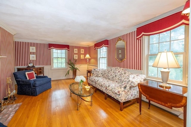 759 Main St, Boxford, MA 01921 - living room featuring crown molding, wood finished floors, a baseboard radiator, and a wainscoted wall