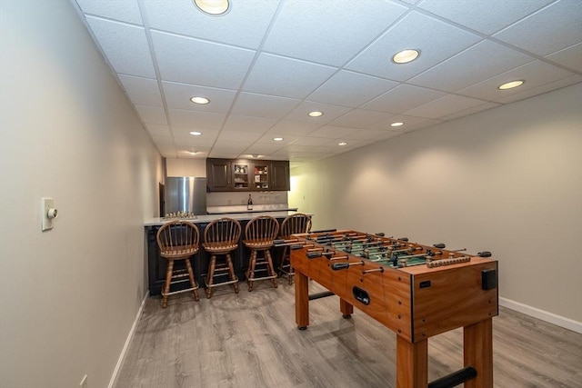759 Main St, Boxford, MA 01921 - game room with bar with sink, light wood-style flooring, and recessed lighting