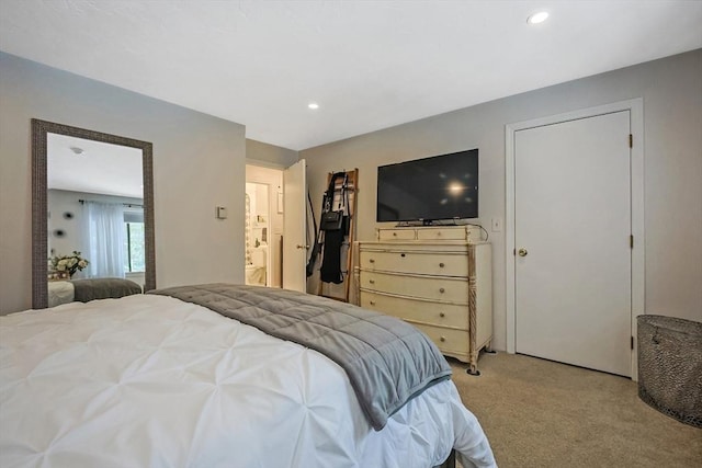 bedroom with light colored carpet