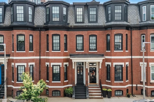 795 E 4th St, Boston, MA 02127 - view of front facade with mansard roof and brick siding