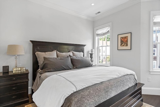 795 E 4th St, Boston, MA 02127 - bedroom featuring dark wood-style flooring, baseboards, crown molding, and recessed lighting