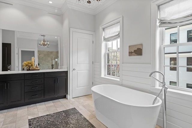 795 E 4th St, Boston, MA 02127 - bathroom featuring a chandelier, a freestanding bath, ornamental molding, double vanity, and a tile shower