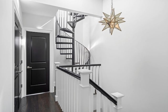 795 E 4th St, Boston, MA 02127 - stairs featuring wood finished floors and a chandelier