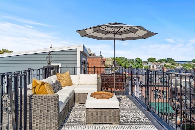 795 E 4th St, Boston, MA 02127 - view of patio with an outdoor hangout area and a balcony