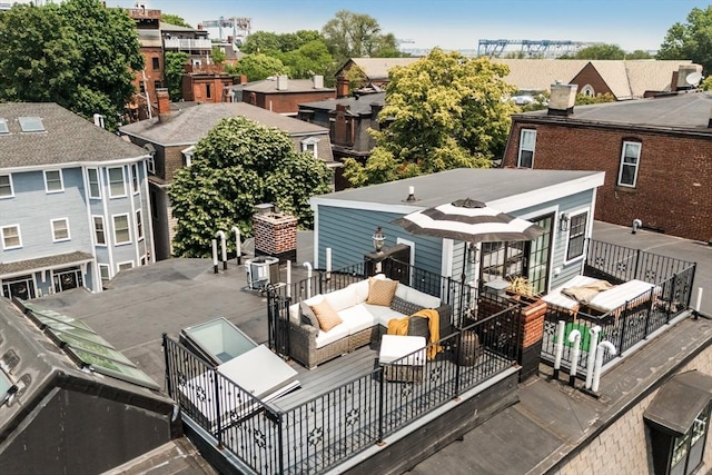 795 E 4th St, Boston, MA 02127 - back of property with an outdoor living space and a residential view