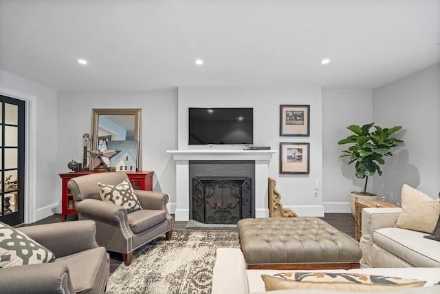 795 E 4th St, Boston, MA 02127 - living room with recessed lighting, baseboards, a fireplace, and wood finished floors