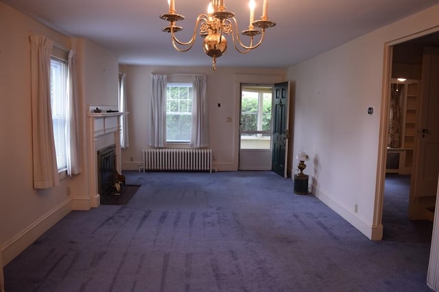 959 Ray St, Fall River, MA 02720 - unfurnished living room featuring radiator heating unit, carpet floors, a chandelier, and a fireplace with flush hearth