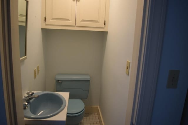 959 Ray St, Fall River, MA 02720 - half bath with tile patterned floors and vanity
