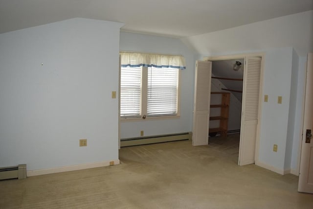959 Ray St, Fall River, MA 02720 - unfurnished bedroom with a baseboard radiator, lofted ceiling, and light colored carpet