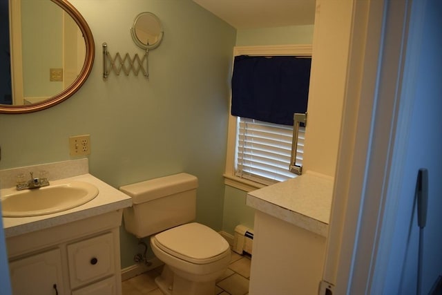959 Ray St, Fall River, MA 02720 - bathroom with vanity, baseboard heating, and tile patterned flooring