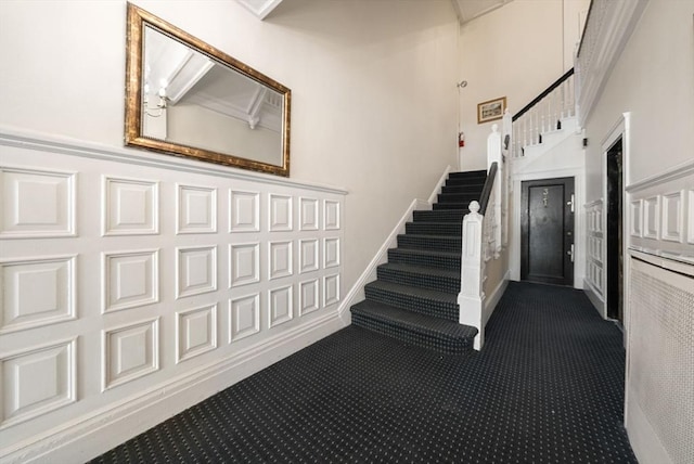 staircase with carpet