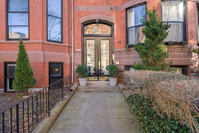 entrance to property featuring french doors