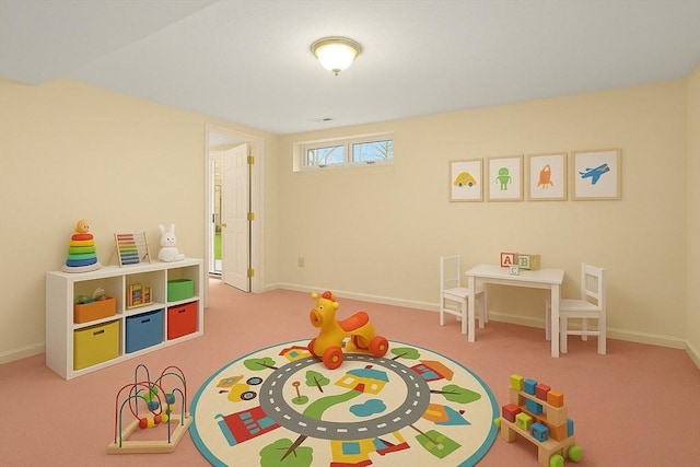 game room with carpet floors and baseboards