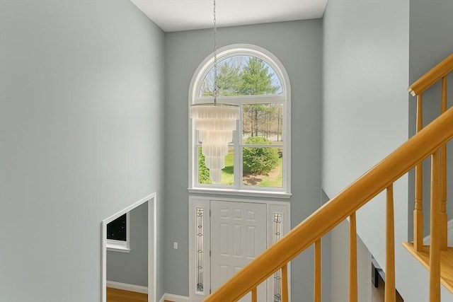 interior space featuring a towering ceiling