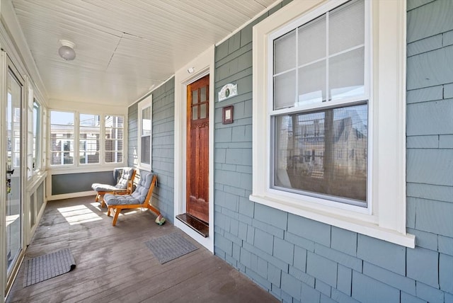 165 Harriet Ave, Quincy, MA 02171 - sunroom with wood finished floors and baseboards