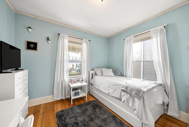 165 Harriet Ave, Quincy, MA 02171 - bedroom featuring light wood-style flooring and crown molding