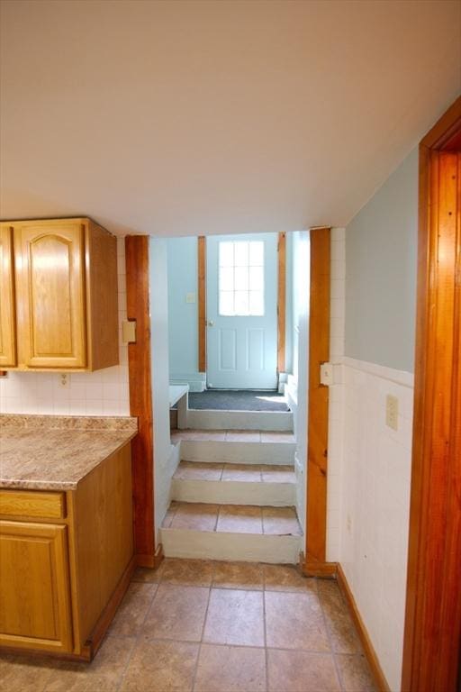 stairway with baseboards