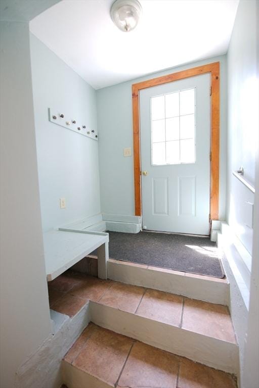 mudroom with tile patterned floors