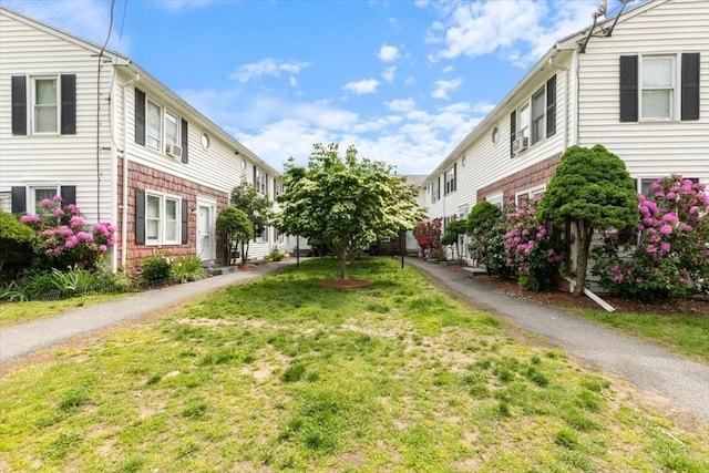 15 Crescent St Unit E, Lawrence, MA 01841 - surrounding community with a lawn