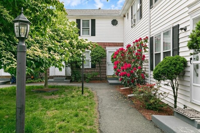 15 Crescent St Unit E, Lawrence, MA 01841 - view of front of property with entry steps and a front lawn