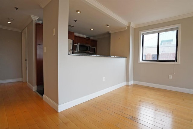 15 N Beacon St Unit 1006, Boston, MA 02134 - unfurnished living room featuring crown molding, light wood-style floors, baseboards, and recessed lighting