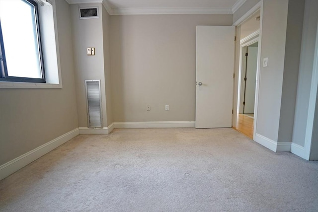 15 N Beacon St Unit 1006, Boston, MA 02134 - spare room with light carpet, crown molding, and baseboards