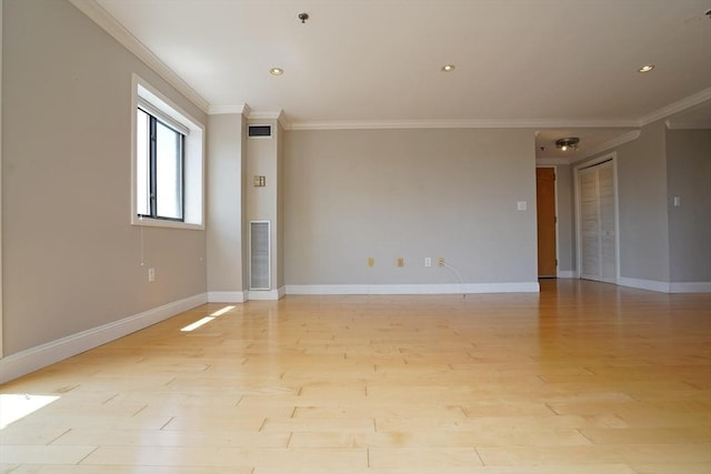 15 N Beacon St Unit 1006, Boston, MA 02134 - unfurnished room with crown molding, light wood-type flooring, baseboards, a pendent fire sprinkler, and recessed lighting