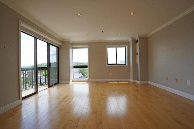 15 N Beacon St Unit 1006, Boston, MA 02134 - empty room with light wood finished floors, baseboards, crown molding, and recessed lighting