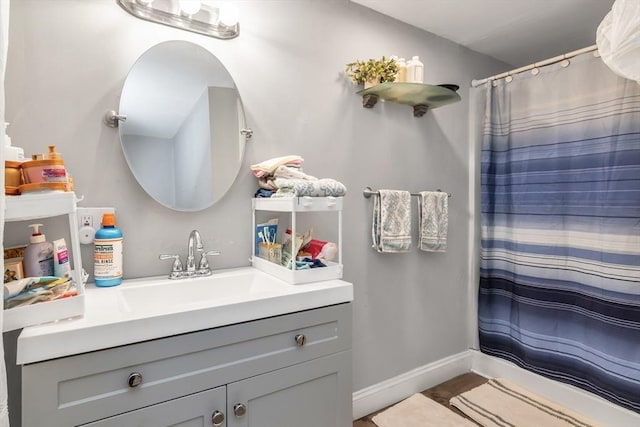 631 Chestnut St, Athol, MA 01331 - bathroom with vanity, curtained shower, and wood finished floors
