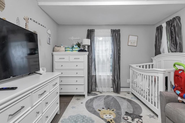 631 Chestnut St, Athol, MA 01331 - bedroom with a nursery area and a baseboard radiator
