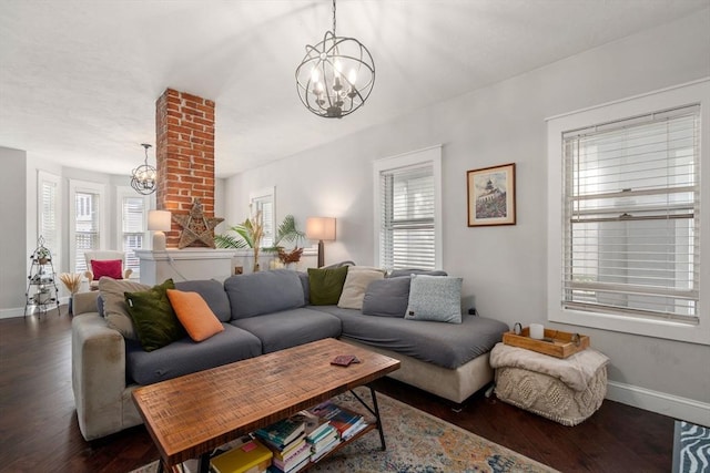 120 Fulton St, Lowell, MA 01850 - living area with a chandelier, wood finished floors, and healthy amount of natural light