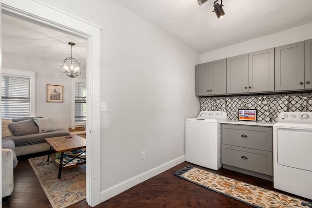 120 Fulton St, Lowell, MA 01850 - laundry area with cabinet space, dark wood-type flooring, a chandelier, and baseboards